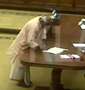 Opening Account: BJP's O. Rajagopal signing register after taking oath in the Assembly