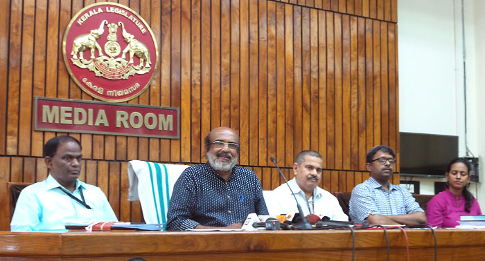 Kerala Finance Minister T. M. Thomas Isaac and officials of his departments at a press conference on Friday